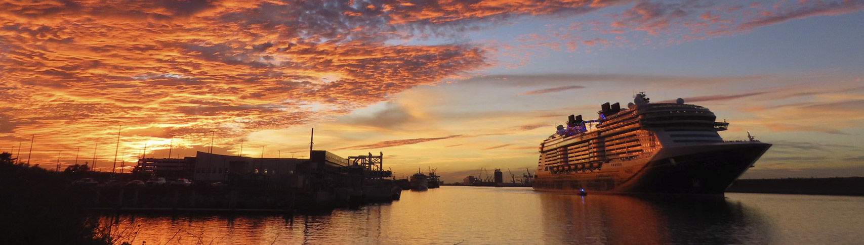 Sunset at Port Canaveral with a cruise ship leaving