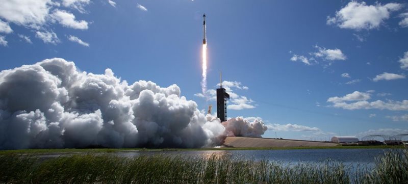 A SpaceX Falcon 9 rocket carrying astronauts on the Dragon spacecraft is  launched on NASA’s SpaceX Crew-5 mission on Oct. 5, 2022 (Photo Credit: NASA/Joel Kowsky)