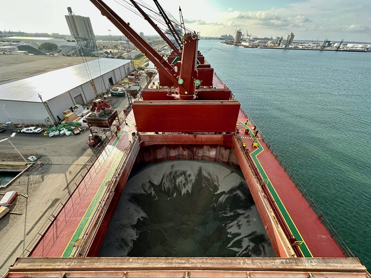 Ship Crane Unloading Aggregate Materials